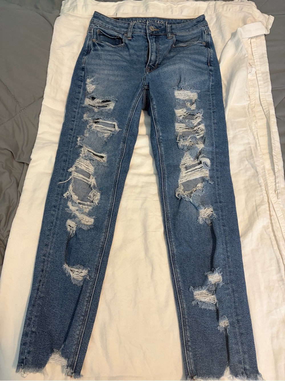 American Eagle Outfitters Blue Ripped Ankle Skinny Jeans